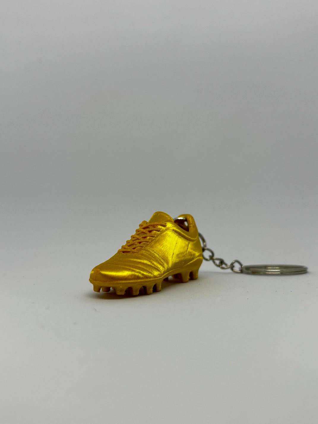 Mini Gold Cleat Keychain